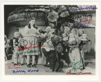 1a1580 WIZARD OF OZ signed 8x10 REPRO still 1939 by TEN of the Munchkin actors, who are w/ Garland!