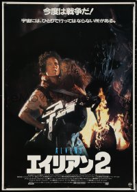 1a2228 ALIENS Japanese 29x41 1986 Cameron, Sigourney Weaver as Ripley carrying Carrie Henn!