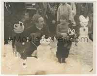 1b2404 WALT DISNEY 7x9 news photo 1933 giving prize to child who won best Mickey Mouse snowman!