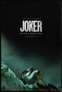 1c1227 JOKER teaser DS 1sh 2019 close-up image of clown Joaquin Phoenix, put on a happy face!