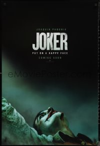 1c1230 JOKER int'l teaser DS 1sh 2019 close-up image of clown Joaquin Phoenix, put on a happy face!