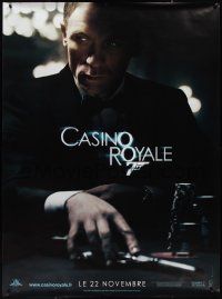 1g0107 CASINO ROYALE teaser DS French 1p 2006 Daniel Craig as James Bond at poker table with gun!