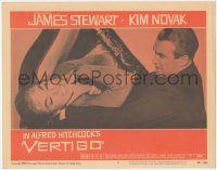 1h0338 VERTIGO LC #4 1958 Alfred Hitchcock classic, c/u of James Stewart choking brunette Kim Novak!
