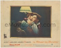 1j1179 STAR IS BORN LC #2 1954 great close up of sad Judy Garland hugging James Mason, classic!
