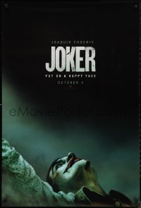 1k1255 JOKER teaser DS 1sh 2019 close-up image of clown Joaquin Phoenix, put on a happy face!