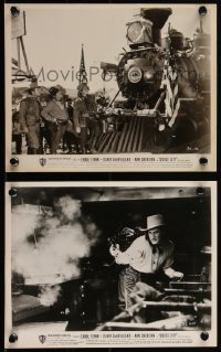 1p1937 DODGE CITY 2 8x10 stills R1951 both with great images of Errol Flynn, shooting and w/ train!