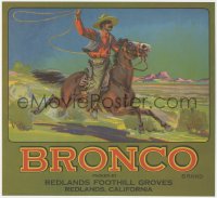 1p1144 BRONCO 10x11 crate label 1940s great art of cowboy swinging his lasso from moving horse!