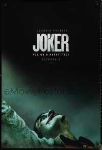 1r1170 JOKER teaser DS 1sh 2019 close-up image of clown Joaquin Phoenix, put on a happy face!