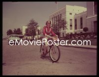 1s0430 GRACE KELLY 4x5 transparency 1950s candid of the beautiful star riding bicycle on studio lot!