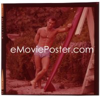 1s0477 ROBERT CONRAD 2.5x2.5 transparency 1960s sexy swimsuit portrait by surfboard on the beach!
