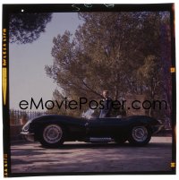 1s0506 STEVE McQUEEN 2x3 transparency 1958 great far shot standing by his new Jaguar XKSS!