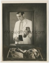 1t2338 TEXAN 8x10 key book still 1930 Gary Cooper holding leather pouch, looking through window!