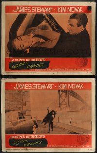 1t1535 VERTIGO 2 LCs 1958 Hitchcock classic, James Stewart choking and carrying blonde Kim Novak!