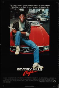 1w0804 BEVERLY HILLS COP 1sh 1984 great image of detective Eddie Murphy sitting on red Mercedes!