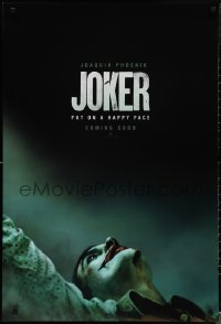 1w0985 JOKER int'l teaser DS 1sh 2019 close-up image of clown Joaquin Phoenix, put on a happy face!