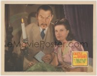 1y1048 CASTLE IN THE DESERT LC 1942 Sidney Toler as Charlie Chan holding candle by Arleen Whelan!