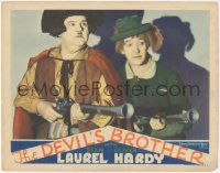 2a0495 DEVIL'S BROTHER LC 1933 close up of Stan Laurel & Oliver Hardy with blunderbuss guns, rare!