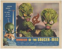 2a0501 INVASION OF THE SAUCER MEN LC #1 1957 close up of cabbage head aliens holding wacky tool!