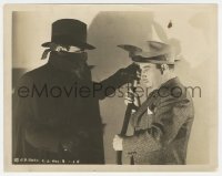 2b1867 SHADOW 8x10.25 still 1940 close up of masked Victor Jory pointing gun at Fiske holding axe!