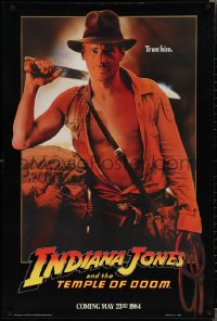 2c1085 INDIANA JONES & THE TEMPLE OF DOOM teaser 1sh 1984 Harrison Ford with machete, trust him!