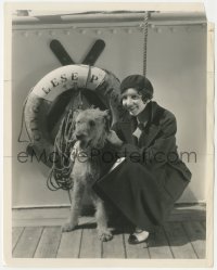 2f1847 CLAUDETTE COLBERT 8x10.25 still 1930 smiling on ship's deck with her adorable dog!