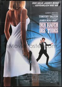 2f0455 LIVING DAYLIGHTS German 1987 image of Dalton as James Bond 007 & sexy Maryam d'Abo w/gun!
