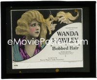2f1505 BOBBED HAIR glass slide 1922 c/u of sad Wanda Hawley getting her long hair cut off!
