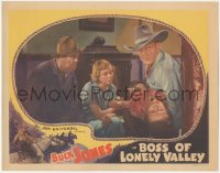 2f1212 BOSS OF LONELY VALLEY LC 1937 close up of cowboy Buck Jones tending to wounded girl!
