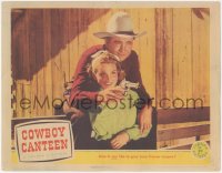 2f1235 COWBOY CANTEEN LC 1944 great close-up of Tex Ritter showing Jane Frazee how to shoot!