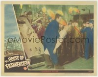 2f1289 HOUSE OF FRANKENSTEIN LC 1944 monster Lon Chaney holding Boris Karloff by crowd w/torches!