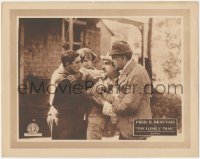 2f1323 LONELY TRAIL LC 1922 woman tries to stop Fred K. Beauvais from fighting with another man!