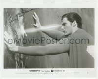 2h0690 CHRISTOPHER REEVE signed 8x10 still 1983 cutting through steel with eyes in Superman III!