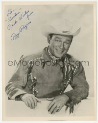 2j0355 ROY ROGERS signed 8x10 REPRO still 1970s standing behind a rail in cool cowboy outfit!