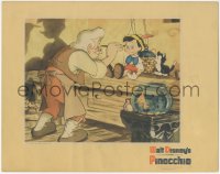2j1515 PINOCCHIO LC 1940 Disney classic cartoon, close up of Gepetto painting the puppet's face!