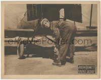 2j1597 YOUTH'S DESIRE LC 1920 close up of Joseph Bennett working on his airplane, ultra rare!