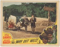 2p1460 WAY OUT WEST LC #7 R1947 Stan Laurel leads mule dragging Oliver Hardy wearing a towel!