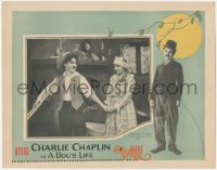 2y1134 DOG'S LIFE LC R1920s c/u of happy Charlie Chaplin holding Edna Purviance's hand, rare!