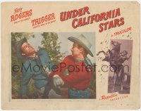 2y1349 UNDER CALIFORNIA STARS LC #8 1948 great close up of cowboy Roy Rogers punching bad guy!