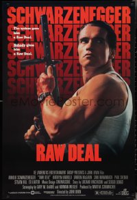 2z1118 RAW DEAL 1sh 1986 great image of tough guy Arnold Schwarzenegger with gun!
