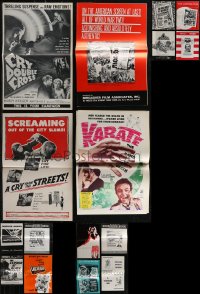 3a0194 LOT OF 16 MOSTLY UNFOLDED UNCUT PRESSBOOKS 1950s-1960s advertising for a variety of movies!