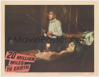 3d0715 20 MILLION MILES TO EARTH LC #8 1957 close up of Sid Cassel holding rifle inside barn!