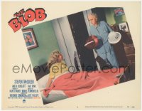 3d0740 BLOB LC #6 1958 girl on bed watches old man in pajamas take out Civil Defense helmet!