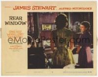 3f0767 REAR WINDOW LC #2 1954 Alfred Hitchcock, Jimmy Stewart, Grace Kelly & Ritter look out window!