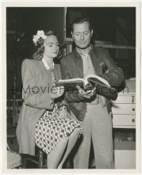 3p2188 THEY WERE EXPENDABLE candid deluxe 8x10 still 1945 Montgomery helps Donna Reed interpret line!