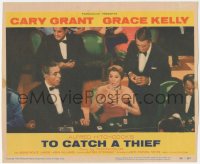 3p1344 TO CATCH A THIEF LC #8 1955 Cary Grant behind woman at casino baccarat table, Alfred Hitchcock