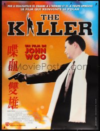 3r0107 KILLER French 1p 1995 John Woo directed, cool close up of Chow Yun-Fat with pistol!