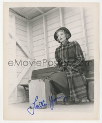 3x0533 LORETTA YOUNG signed 8.25x10 still 1947 sitting on bench by luggage in The Farmer's Daughter!