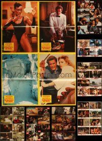 4a0483 LOT OF 11 FOLDED 1970S-80S SEAN CONNERY & ROGER MOORE JAMES BOND GERMAN LOBBY CARD POSTERS 1970s-1980s