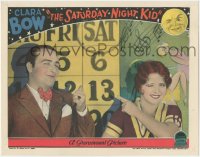 4b0643 SATURDAY NIGHT KID LC 1929 Clara Bow smiling & winking at James Hall by huge calendar, rare!