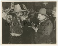 4f1528 ROUND-UP 8x10 key book still 1920 c/u of cowboy Fatty Arbuckle pointing gun at man, rare!